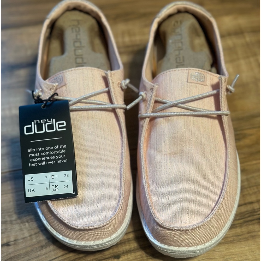 Women’s pink glitter Hey Dudes